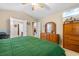 Main bedroom with a king bed, walk-in closet, and en-suite bathroom access at 544 Running Deer Trail, Myrtle Beach, SC 29588
