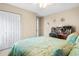 Second bedroom with a full-size bed, built in desk and ceiling fan at 544 Running Deer Trail, Myrtle Beach, SC 29588