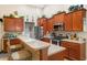 Kitchen with island, stainless steel appliances, and breakfast bar at 544 Running Deer Trail, Myrtle Beach, SC 29588