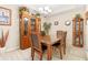 Bright dining room featuring wood table and hutch at 544 Running Deer Trail, Myrtle Beach, SC 29588
