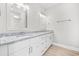 Double vanity bathroom with granite countertop and large mirrors at 1900 Blue Bird Rd., Loris, SC 29569