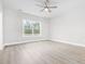 Bedroom with ceiling fan and large window at 1900 Blue Bird Rd., Loris, SC 29569