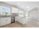 Kitchen with island, stainless steel appliances, and view to living room at 1900 Blue Bird Rd., Loris, SC 29569