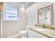Updated bathroom with granite countertop, new vanity, and tile flooring at 615 1St Ave. N, Surfside Beach, SC 29575