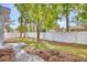 Fenced backyard with a patio and trees at 615 1St Ave. N, Surfside Beach, SC 29575
