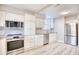 Modern kitchen featuring stainless steel appliances and granite countertops at 615 1St Ave. N, Surfside Beach, SC 29575