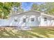White board and batten exterior, fenced yard at 615 1St Ave. N, Surfside Beach, SC 29575
