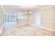 Bright dining area with chandelier and open concept design at 615 1St Ave. N, Surfside Beach, SC 29575