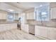 Updated kitchen boasts stainless steel appliances and ample cabinet space at 615 1St Ave. N, Surfside Beach, SC 29575