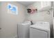 Laundry room with washer, dryer, and overhead shelving at 300 Golan Circle # C, Myrtle Beach, SC 29579