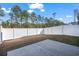 Private backyard with a large patio and white vinyl fence at 300 Golan Circle # C, Myrtle Beach, SC 29579