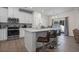 Modern kitchen with white cabinets and kitchen island at 300 Golan Circle # C, Myrtle Beach, SC 29579