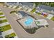 Community pool with surrounding patio and parking at 300 Golan Circle # C, Myrtle Beach, SC 29579