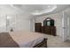 Main bedroom with plush carpet and large dresser at 300 Golan Circle # C, Myrtle Beach, SC 29579