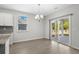 Bright dining area with sliding glass doors leading to patio at 508 Shellbark Dr., Longs, SC 29568