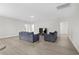 Spacious living room with two sofas and wood-look flooring at 508 Shellbark Dr., Longs, SC 29568