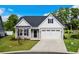 Single-Gathering home with two-car garage and landscaping at 508 Shellbark Dr., Longs, SC 29568