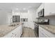 Modern kitchen with stainless steel appliances and granite countertops at 508 Shellbark Dr., Longs, SC 29568