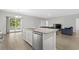 Kitchen island with granite countertop and stainless steel dishwasher at 508 Shellbark Dr., Longs, SC 29568