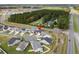 An aerial view of a house situated in a residential development at 508 Shellbark Dr., Longs, SC 29568