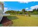 Landscaped backyard with mulch beds and privacy fence at 508 Shellbark Dr., Longs, SC 29568