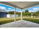 Covered patio overlooking backyard with grassy lawn at 508 Shellbark Dr., Longs, SC 29568
