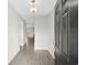 Bright and spacious entryway with dark door at 508 Shellbark Dr., Longs, SC 29568