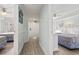 Hallway connecting bedrooms with light wood flooring at 205 N 74Th Ave. N # 1106, Myrtle Beach, SC 29572