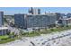 Aerial view of beachfront high-rise building with pool and beach access at 205 N 74Th Ave. N # 1106, Myrtle Beach, SC 29572