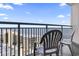 Balcony with ocean view and chairs at 205 N 74Th Ave. N # 1106, Myrtle Beach, SC 29572
