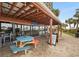 Beachfront patio with picnic tables and ocean views at 205 N 74Th Ave. N # 1106, Myrtle Beach, SC 29572