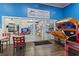 Beachwear store with arcade games and seating area at 205 N 74Th Ave. N # 1106, Myrtle Beach, SC 29572