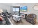 Relaxing living area with ocean view and comfortable seating at 205 N 74Th Ave. N # 1106, Myrtle Beach, SC 29572