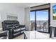Living room boasts ocean views from sliding doors to balcony at 205 N 74Th Ave. N # 1106, Myrtle Beach, SC 29572