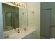 Double vanity bathroom with a large mirror and separate shower at 9606 Indigo Creek Blvd., Murrells Inlet, SC 29576