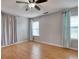 Bright bedroom with hardwood floors and ceiling fan at 4337 Spa Dr. # 1309, Little River, SC 29566