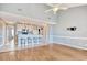 Open concept kitchen with island, light cabinets, and breakfast bar at 4337 Spa Dr. # 1309, Little River, SC 29566