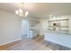 Bright dining area with hardwood floors and a chandelier at 807 Busy Corner Rd., Conway, SC 29527