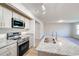 Modern kitchen featuring stainless steel appliances and granite countertops at 807 Busy Corner Rd., Conway, SC 29527