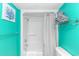 Shower/tub combo, teal walls, clean at 7100 N Ocean Blvd. # 218, Myrtle Beach, SC 29572