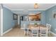 Bright dining area with table and chairs, adjacent to kitchen at 7100 N Ocean Blvd. # 218, Myrtle Beach, SC 29572