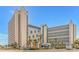 Ocean Reef Resort, a seaside resort with palm trees and parking at 7100 N Ocean Blvd. # 218, Myrtle Beach, SC 29572