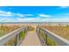 Convenient beach access walkway over sand dunes at 7100 N Ocean Blvd. # 218, Myrtle Beach, SC 29572