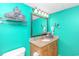 Vanity with granite top, teal walls at 7100 N Ocean Blvd. # 218, Myrtle Beach, SC 29572