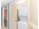 Stackable washer and dryer in a compact laundry closet at 7100 N Ocean Blvd. # 218, Myrtle Beach, SC 29572