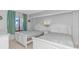 Bright bedroom with two twin beds and beach-themed decor at 5308 N Ocean Blvd. # 1115, Myrtle Beach, SC 29577