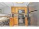Well-equipped kitchen with black appliances at 5308 N Ocean Blvd. # 1115, Myrtle Beach, SC 29577