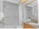 Clean bathroom with tub shower, granite vanity, and fresh towels at 5308 N Ocean Blvd. # 1115, Myrtle Beach, SC 29577