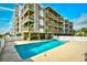 Sparkling community pool with ample deck space at 4305 S Ocean Blvd. # 205, North Myrtle Beach, SC 29582