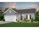 Gray house with two-car garage and landscaped yard at 292 Hawks Run Dr., Calabash, NC 28467